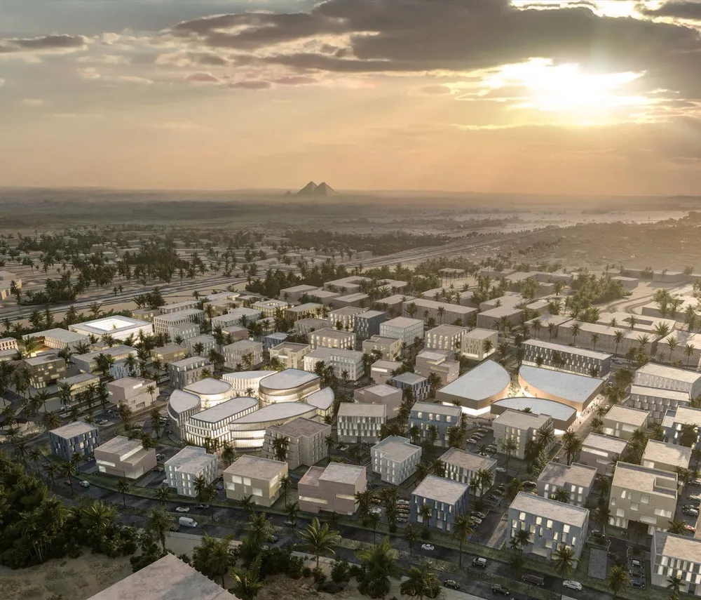 O West Business District in October Gardens by Orascom Development Egypt في October Gardens - صورة المشروع